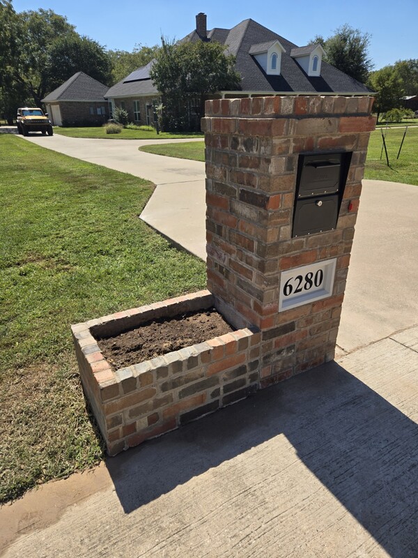 Restored brick mailbox in North Texas – before and after repair showing professional masonry craftsmanship near Fort Worth