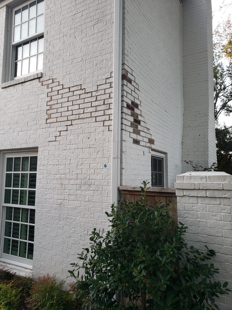 Brick replacement on painted residential home in Fort Worth, TX – matching and installing new bricks by skilled masonry contractors