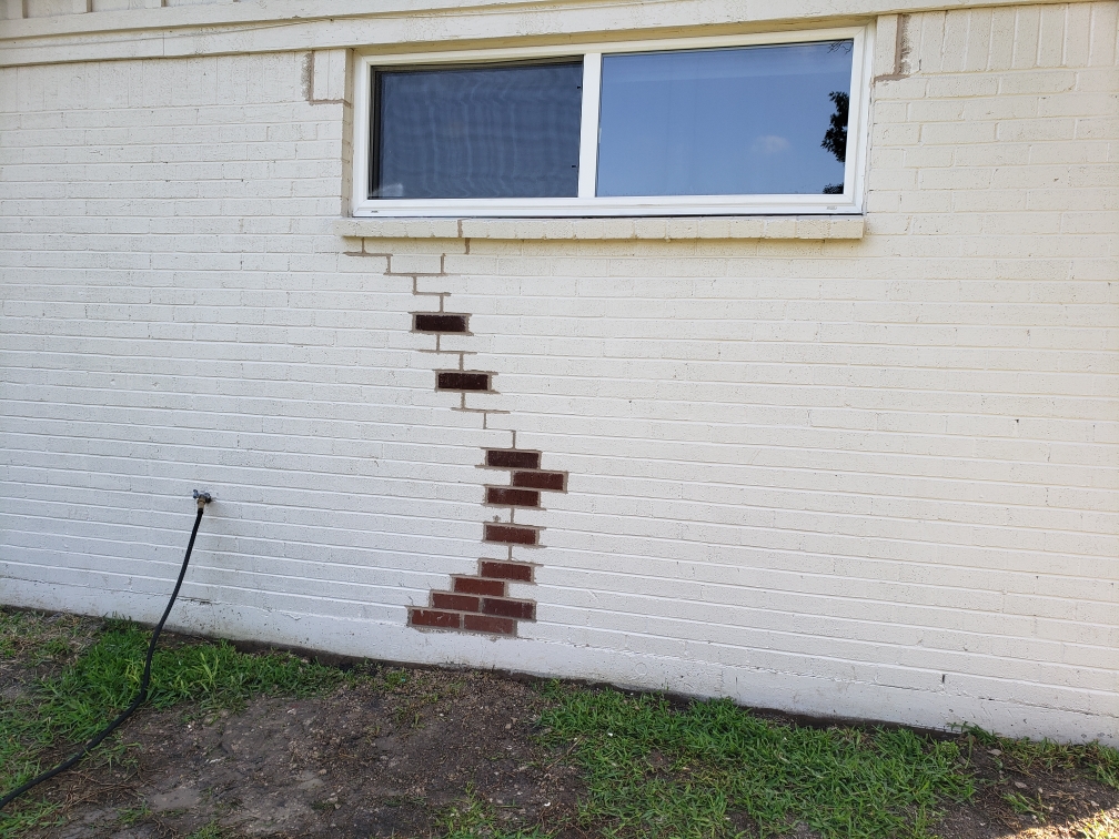 Brick replacement and repointing on Fort Worth, TX residential home – professional masonry repair restoring structural integrity and curb appeal