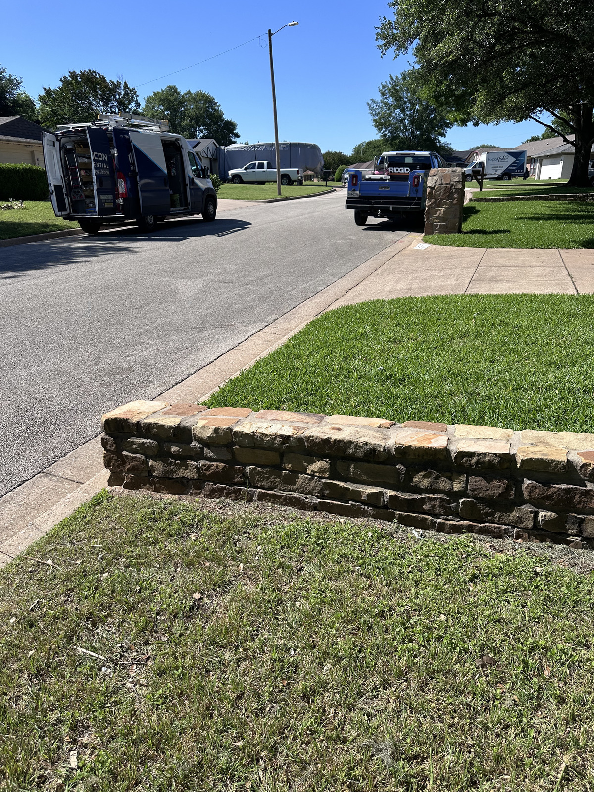 Small brick retaining wall construction for residential lawn in Crowley, TX – professional landscape masonry by Fort Worth Brick Repair